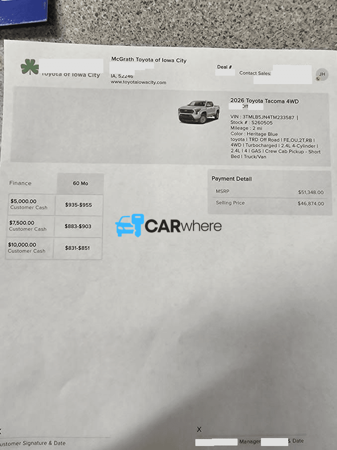 Redacted 2026 Toyota Tacoma TRD Off Road deal sheet from Mcgrath Toyota of Iowa City in Iowa City, IA — what a verified buyer paid